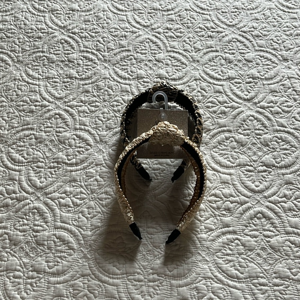 Two brand new head bands (one with tags)